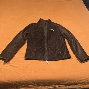 The North Face brown sweater women size medium.